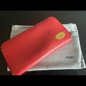 Fendi large coral colored zippy wallet